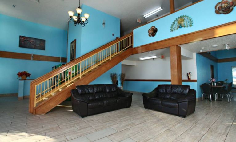 Lobby area at Coratel Inn & Suites By Jasper Newton.