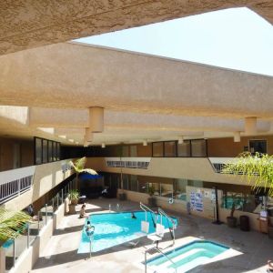 Refreshing outdoor pool at The Pacific Inn.