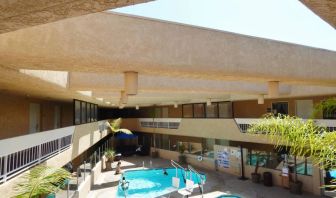 Refreshing outdoor pool at The Pacific Inn.