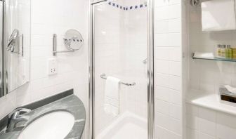 Private guest bathroom with shower at Hilton Garden Inn Bristol City Centre.