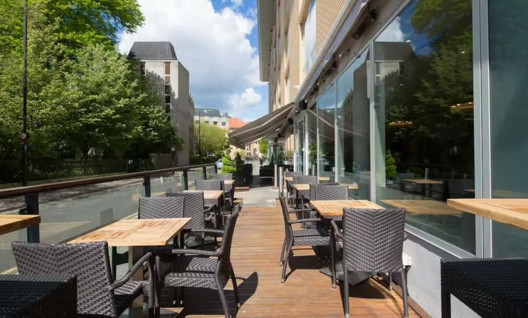 Pretty outdoor terrace ideal as a coworking space at Hilton Garden Inn Bristol City Centre.