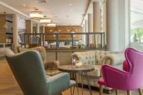 Lounge and coworking space at Hilton Garden Inn Bristol City Centre.