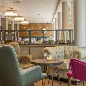 Lounge and coworking space at Hilton Garden Inn Bristol City Centre.