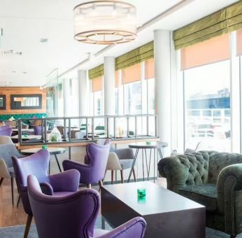 Lounge and coworking space at Hilton Garden Inn Glasgow City Centre.