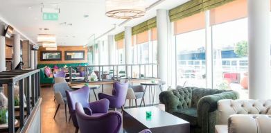 Lounge and coworking space at Hilton Garden Inn Glasgow City Centre.