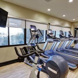 Well equipped fitness center at Embassy Suites By Hilton Santa Clara Silicon Valley.