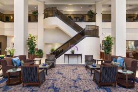 Lounge and coworking space at Embassy Suites By Hilton Santa Clara Silicon Valley.