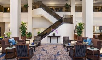 Lounge and coworking space at Embassy Suites By Hilton Santa Clara Silicon Valley.