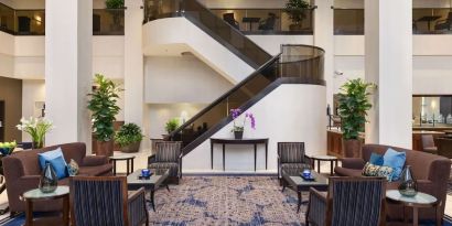 Lounge and coworking space at Embassy Suites By Hilton Santa Clara Silicon Valley.