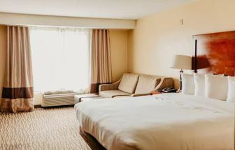 Delux king room with natural light at Comfort Inn Pomona Near Fairplex.