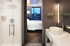 Private guest bathroom with shower at Le Méridien Columbus, The Joseph.