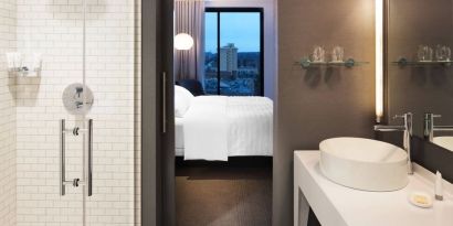 Private guest bathroom with shower at Le Méridien Columbus, The Joseph.