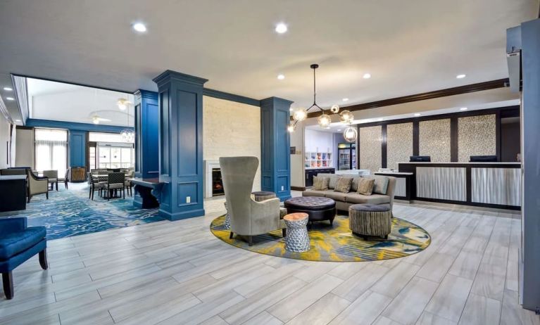 Lobby and coworking space at Homewood Suites By Hilton Dallas-Lewisville.