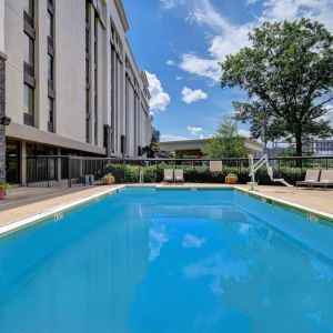 Refreshing outdoor pool at Hampton Inn & Suites Alexandria.