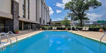 Refreshing outdoor pool at Hampton Inn & Suites Alexandria.