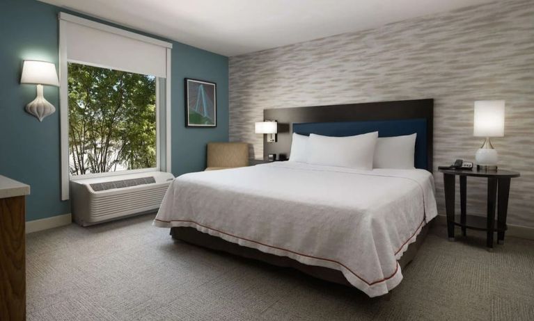 Delux king bed with natural light at Home2 Suites By Hilton Charleston Airport/Convention Center.