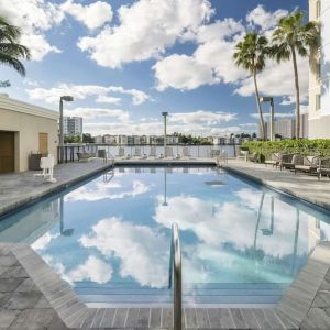 Refreshing outdoor pool at Homewood Suites By Hilton Miami Airport-Blue Lagoon.