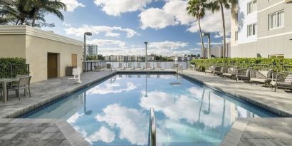 Refreshing outdoor pool at Homewood Suites By Hilton Miami Airport-Blue Lagoon.