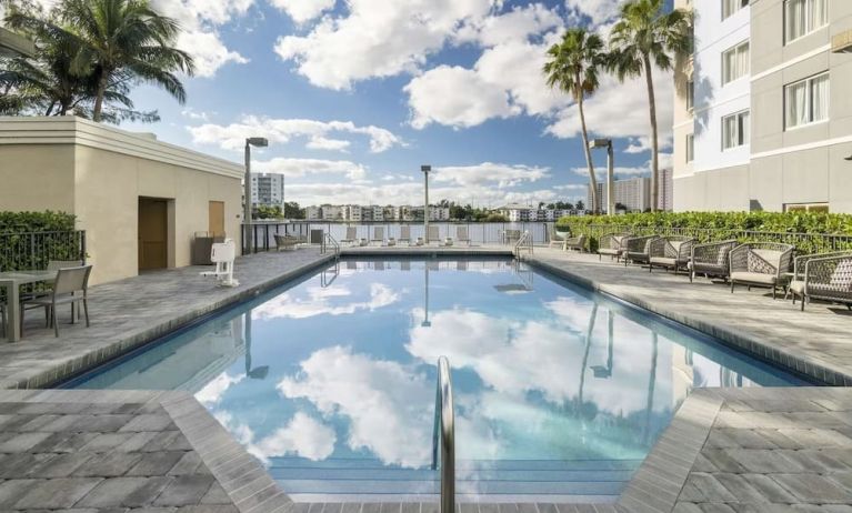 Refreshing outdoor pool at Homewood Suites By Hilton Miami Airport-Blue Lagoon.