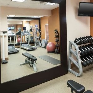 Fitness center at Homewood Suites By Hilton Miami Airport-Blue Lagoon.