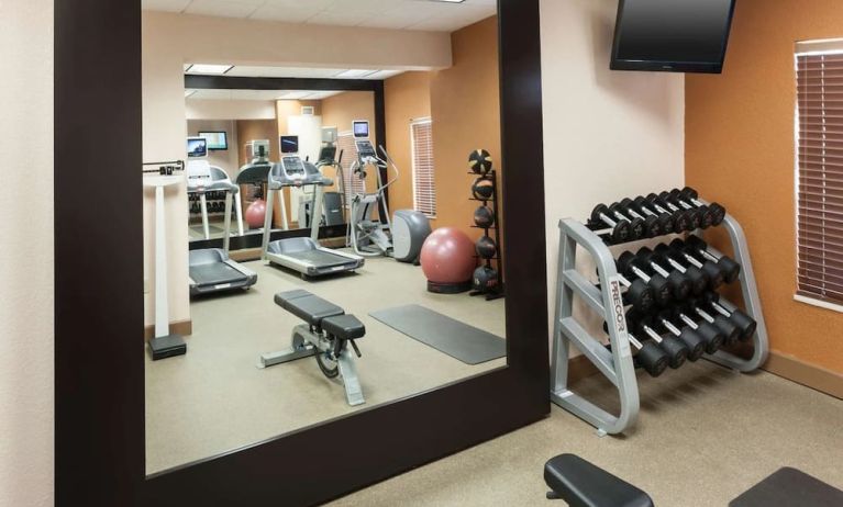 Fitness center at Homewood Suites By Hilton Miami Airport-Blue Lagoon.