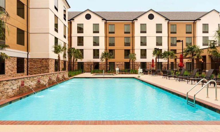 Large outdoor pool at Hilton Garden Inn Shreveport Bossier City.