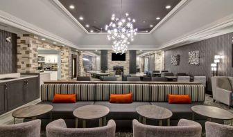 Lounge and coworking space at Homewood Suites By Hilton Burlington.