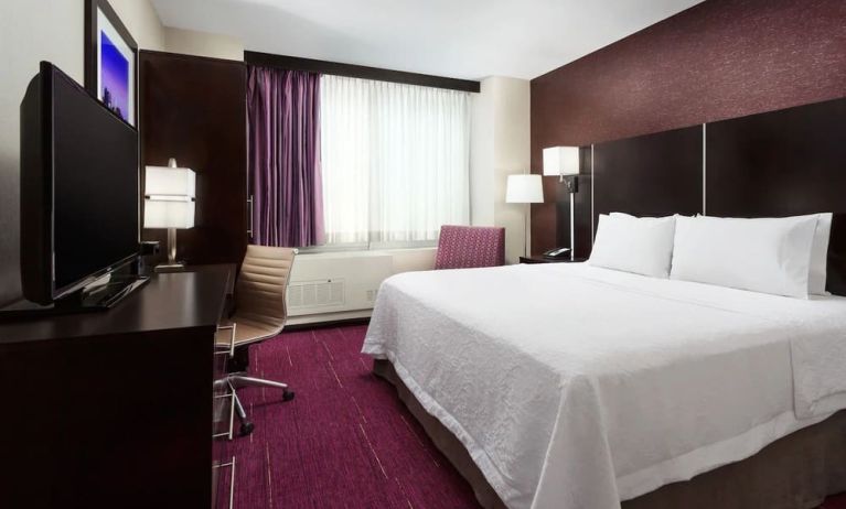 Delux king room with TV at Hampton Inn Manhattan/Times Square Central.