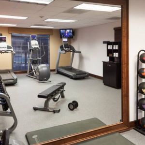 Well equipped fitness center at Homewood Suites By Hilton Denton.