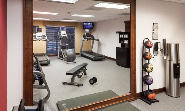 Well equipped fitness center at Homewood Suites By Hilton Denton.