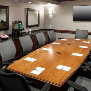 Professional meeting room at Homewood Suites By Hilton Denton.