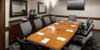 Professional meeting room at Homewood Suites By Hilton Denton.