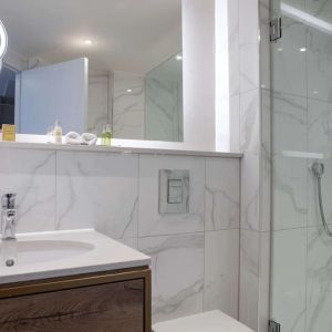 Guest bathroom with shower at DoubleTree By Hilton Stoke On Trent.