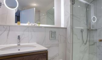 Guest bathroom with shower at DoubleTree By Hilton Stoke On Trent.