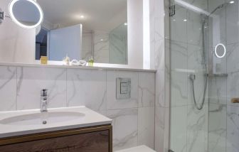 Guest bathroom with shower at DoubleTree By Hilton Stoke On Trent.