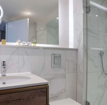 Guest bathroom with shower at DoubleTree By Hilton Stoke On Trent.