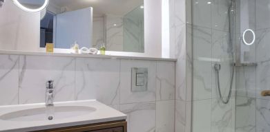 Guest bathroom with shower at DoubleTree By Hilton Stoke On Trent.