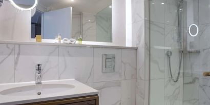 Guest bathroom with shower at DoubleTree By Hilton Stoke On Trent.