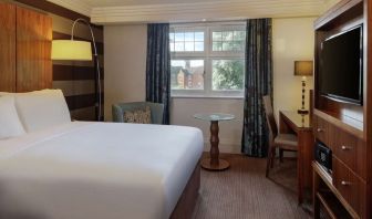 King bed with TV at DoubleTree By Hilton Stratford-upon-Avon.