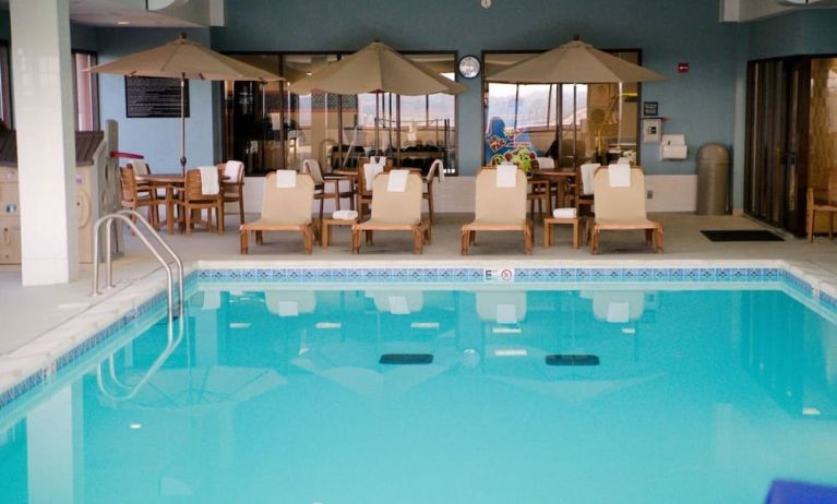 Indoor pool with seating area at Hampton Inn St. Louis-Downtown (At The Gateway Arch).