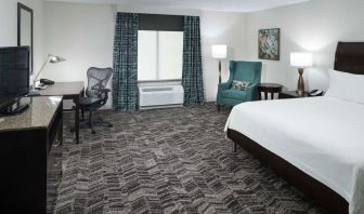 King bed with natural light at Hilton Garden Inn Dothan.