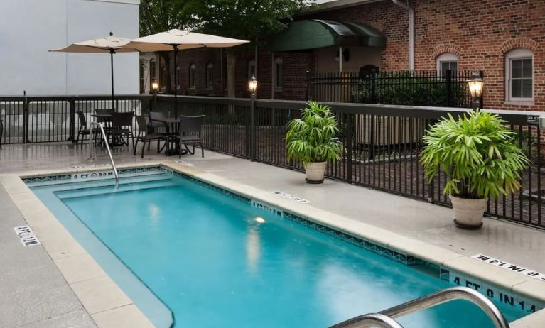 Stunning outdoor pool at Hampton Inn & Suites Gainesville-Downtown.