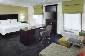 Delux king room with natural light at Hampton Inn & Suites Gainesville-Downtown.