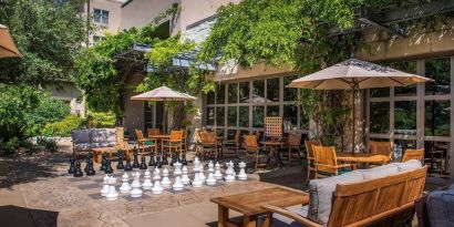 Outdoor garden and coworking space at Hilton San Antonio Hill Country.