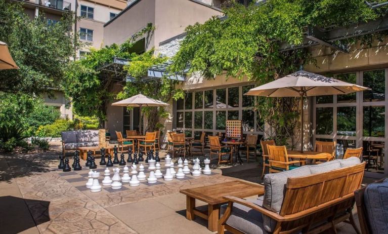 Outdoor garden and coworking space at Hilton San Antonio Hill Country.