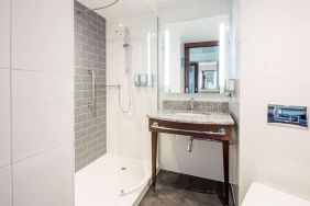 Guest bathroom with shower at Hampton By Hilton Humberside Airport.