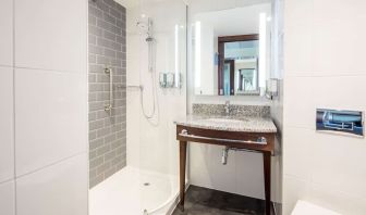 Guest bathroom with shower at Hampton By Hilton Humberside Airport.