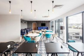 Dining and coworking space at Hampton By Hilton Humberside Airport.