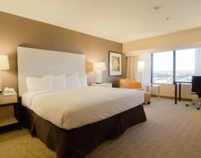 Delux king room with natural light at Hilton Los Angeles Airport.
