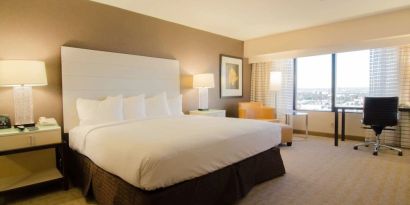 Delux king room with natural light at Hilton Los Angeles Airport.